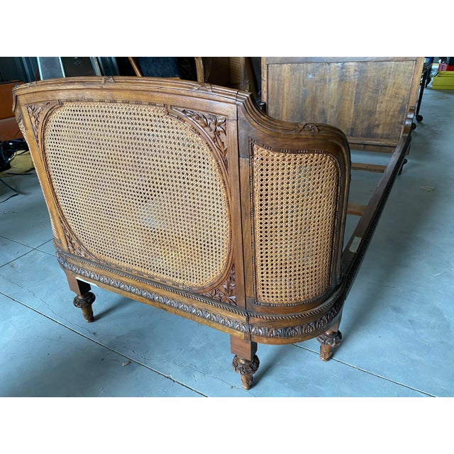 We have a pair in of antique cane and carved wood twin beds. This listing is for only one. Headboard, footboard, side...