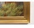 A warm, atmospheric Danish School genre painting depicting sailors resting on the shore among nets, crates, and beached...