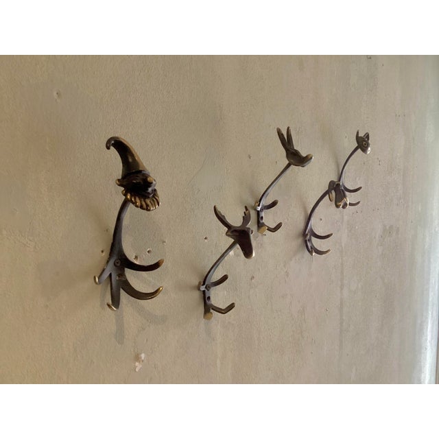 Vintage Hooks by Walter Bosse, Set of 5, in Very Good conditions. Designed 1950 to 1959 This piece is attributed to the...