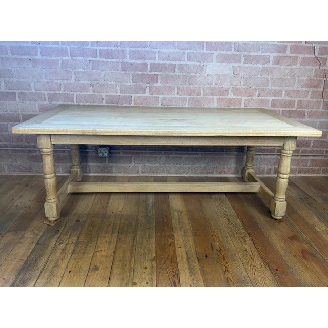 The epitome of quiet luxury and Belgian-inspired minimalism, this French Country farmhouse dining table is a masterclass...
