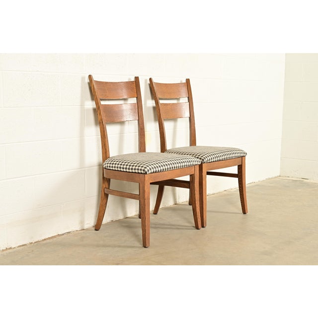 An exceptional pair of Mission or Arts & Crafts style side chairs or dining chairs By Stickley USA, Circa Late 20th...