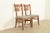 An exceptional pair of Mission or Arts & Crafts style side chairs or dining chairs By Stickley USA, Circa Late 20th...