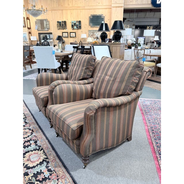 A distinguished pair of Hartwell lounge chairs by Wesley Hall, combining timeless American craftsmanship with exceptional...