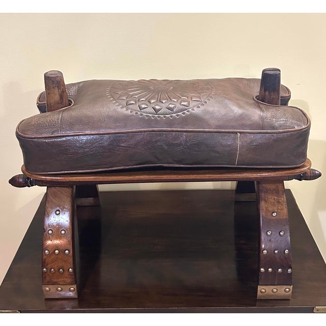 Traditional Mid-20th Century, Egyptian, Wooden Camel Saddle/Stool, With a Hand/Tooled, Embossed, Leather Cushion, and Brass Feet and Stud Ornamentation, 1950 For Sale - Image 3 of 10
