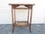 Antique English bamboo table, c.1900 A classic English bamboo table with a rectangular top with a lower shelf. All the...