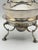 A handsome Edwardian silver plate teapot and burner stand set, dating to the early 20th century. Together, the teapot and...