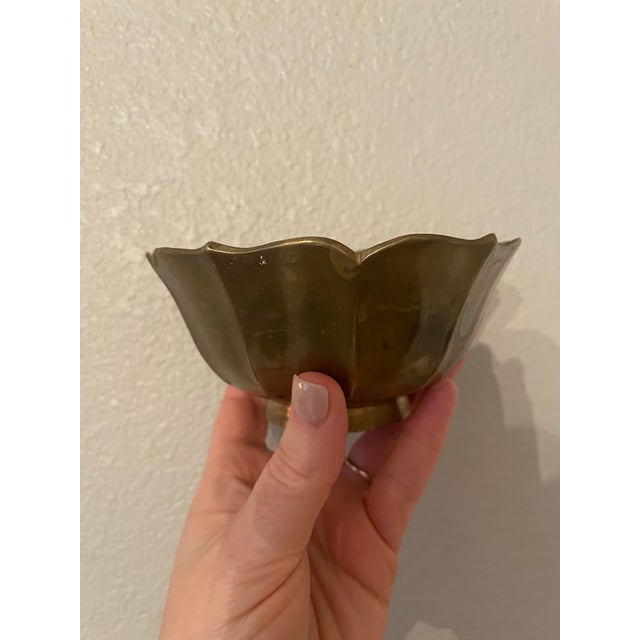 Lovely vintage MCM brass bowl shaped like a lotus flower. Beautiful natural patina consistent with age. Perfect as an...