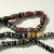 Early 20th Century Venetian Feather Striped Skunk Thousand Eye Millefiori African Trade Glass Beads For Sale - Image 9 of 11