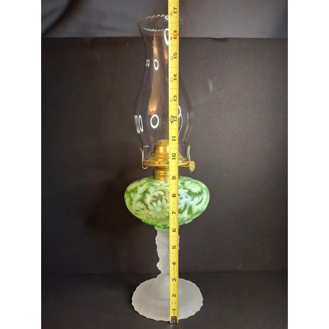 Elevate your space with this captivating decorative table lamp, a sophisticated study in form and aesthetic charm. The...