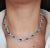 This exquisite necklace features 13.20 carats of 23 oval-cut blue sapphires. Accentuated by 5.15 carats of 737 round-cut...