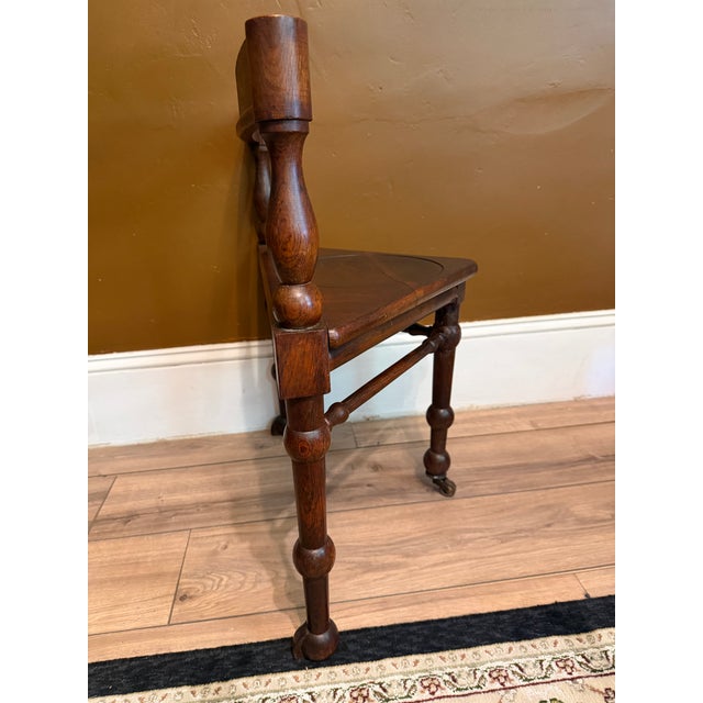 This chair is a local Northeastern Pennsylvania estate find. The chair has a sliding mechanism underneath that allows the...