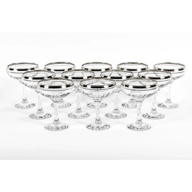 Offering this vintage set of 12 real platinum crystal champagne coupes or martini glasses. They are in excellent...