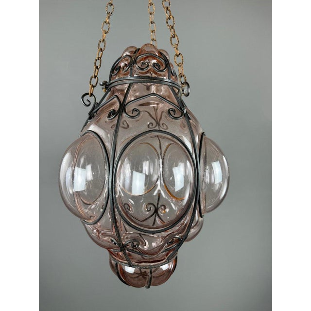 Italian blown glass and metal lantern, 1960s A magnificent Italian lantern from the 1960s, crafted from blown glass and...