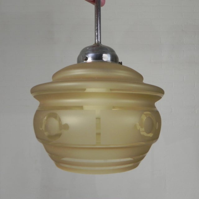 Height: 40 cm. Diameter: 18 cm. Height of glass shade: 14 cm. The lamp is fitted with new wiring and a large socket (E27)....