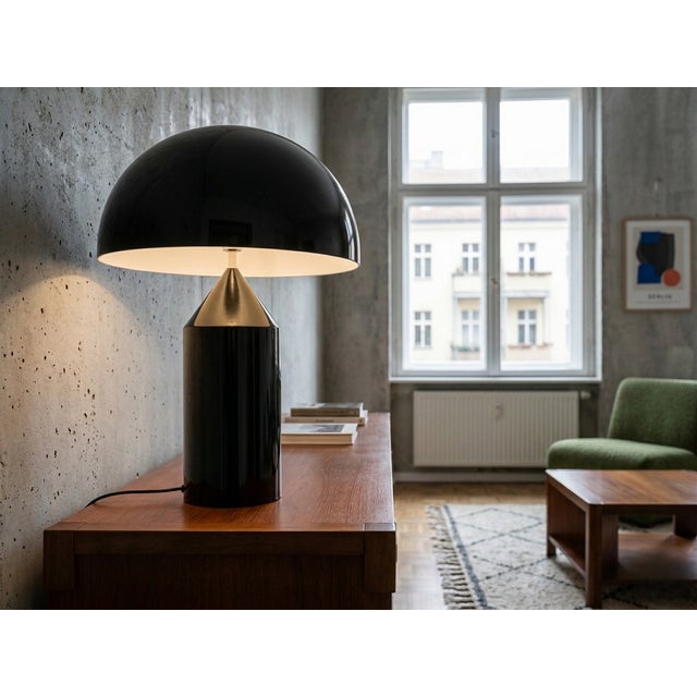 Are you looking for a unique and trendy vintage statement piece? Distinguish your living space with this iconic Atollo 233...