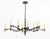 Thomas O' Brien Baroque Style Iron and Brass Five-Arm Chandelier, five arms branching onto fifteen candlestick style light...