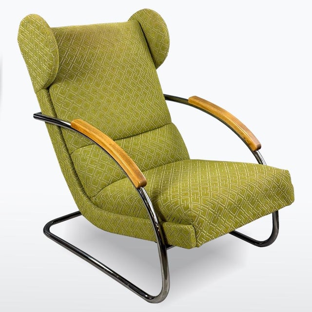 This reclining armchair is the catalogued model fn 26 by mücke-melder, designed by czech architect arnošt beck during the...