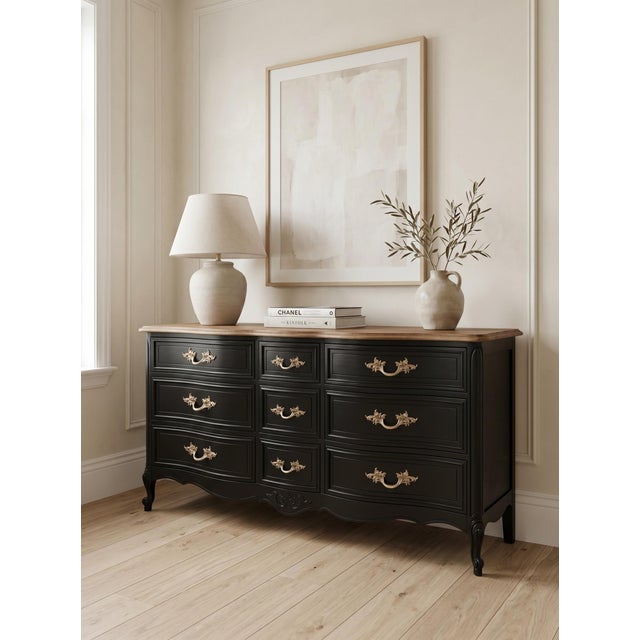This stunning vintage Dixie Furniture dresser has been professionally refinished in a rich lamp black finish, creating the...