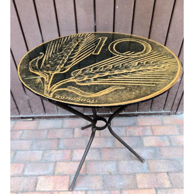 Bar table "ten lire" brass base e lacquered top 1950c. italy h 68 cm - diam. 63 cm this piece is attributed to the...