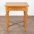 Danish country pine side table with turned legs and small single drawer. Note the metal rods that cross the base, adding...