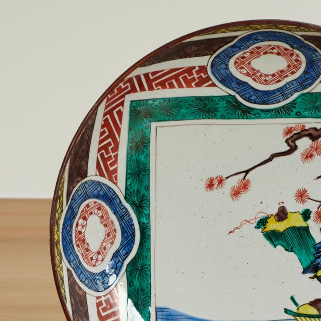 Charming 19th century Japanese Katuni porcelain bowl handcrafted in classic form and hand decorated in traditional bold...