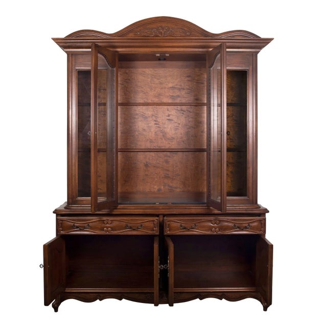 Classical style sideboard with hutch. This sideboard with hutch in the Classical style features four glass front doors...