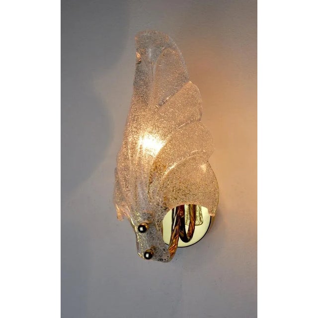 Superb wall lamp by carl fagerlund for lyfa from the 70s. Structure in gilded metal and frosted leaf-shaped glass. The...