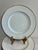 An elegant set of 12 Wedgwood bone china dinner plates in the "California" pattern, featuring a wide gold rim band and...