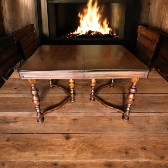 1940s solid oak draw-leaf table. This is a beautiful piece of solid solid wood (gorgeous!) and well cared for table. With...