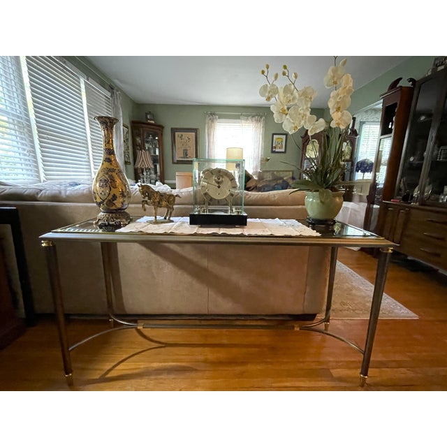 Up for sale is an authentic, highly collectible Postmodern console / sofa table manufactured by the Design Institute...