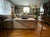 Up for sale is an authentic, highly collectible Postmodern console / sofa table manufactured by the Design Institute...