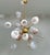 Italian modern sputnik chandelier with twenty four Murano glass shades hand blown in organically squashed shape, mounted...