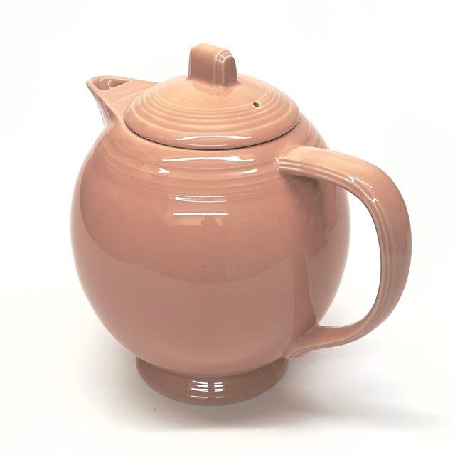 Vintage blush pink teapots, group of 3. An eclectic group of blush-pink lidded teapots, primarily from the mid-20th...