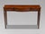 An elegant late 20th century console table by Arthur Brett & Sons. This refined piece combines classic English design with...