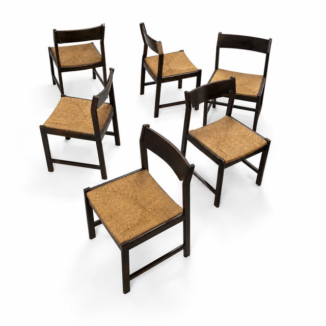 Set of 6 chairs attributed to the Dutch designer Gerard Geytenbeek for AZS Meubelen. Solid stained oak with rush seats....