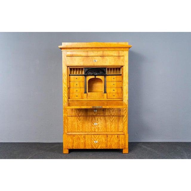 Standing secretary Era & style: Biedermeier - first half of the 19th century Features ⁃ decorative and practical furniture...