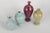Per Liljegren, set of four miniature vases. Set of four hand-thrown miniature stoneware vases with elegant organic forms...