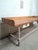 Original industrial baker's table with a solid beech wood top and white steel base. The worktop has been refinished with...