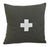 Custom-tailored pillow created from a dark green wool textile. Pillow has a cream-colored wool appliqué cross on the...