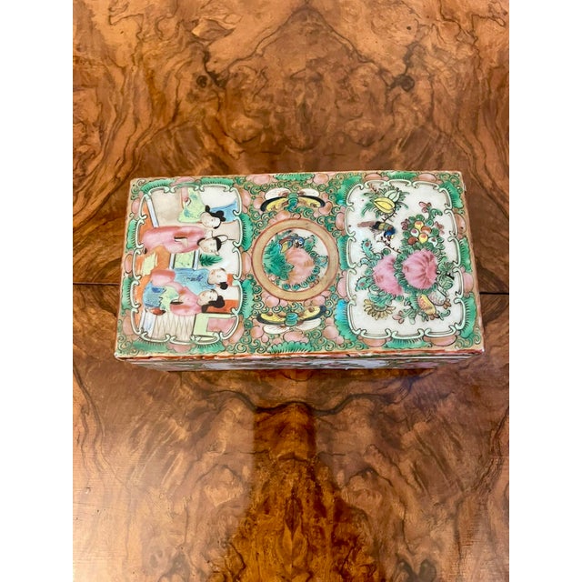 Antique 19th century quality Chinese Famille Rose Canton lidded pen box hand painted in the Famille Rosé taste depicting...