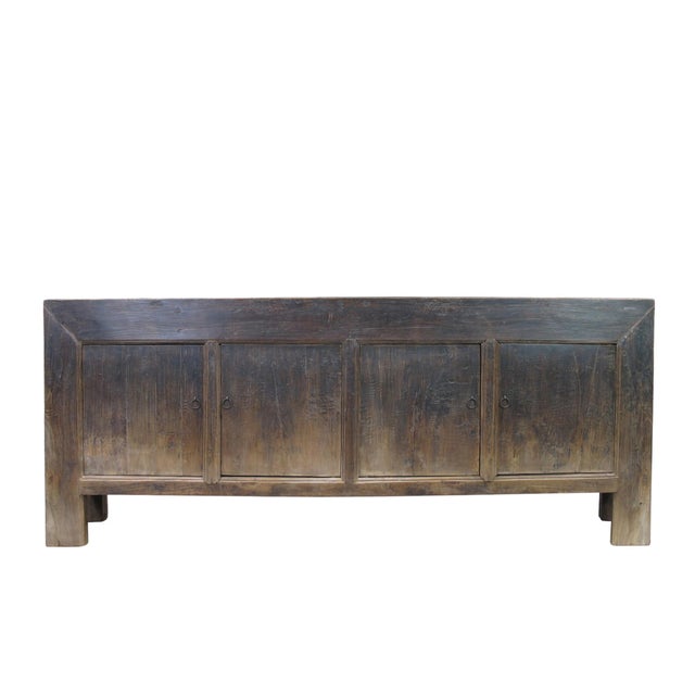 This vintage sideboard is made from reclaimed solid wood featuring weathered, dark charcoal brown finish with rustic...
