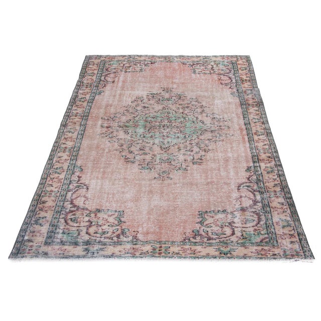 Vintage hand-knotted rug from the Oushak region of Turkey. Approximately 50-60 years old. In very good condition.