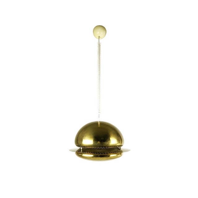 Golden metal and optical glass Nictea pendant by Afra e Tobia Scarpa for Flos. Very good condition, few light defects on...