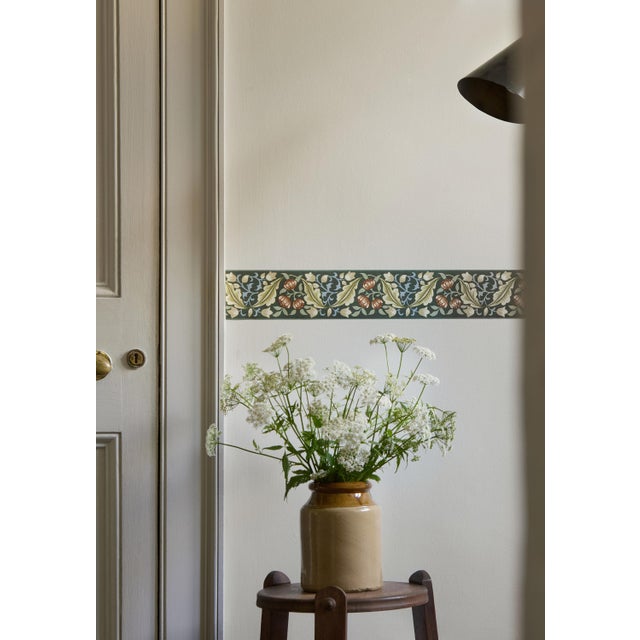 Celebrating the beauty of the original document which had a typical Morris visual narrative this horizontal border...