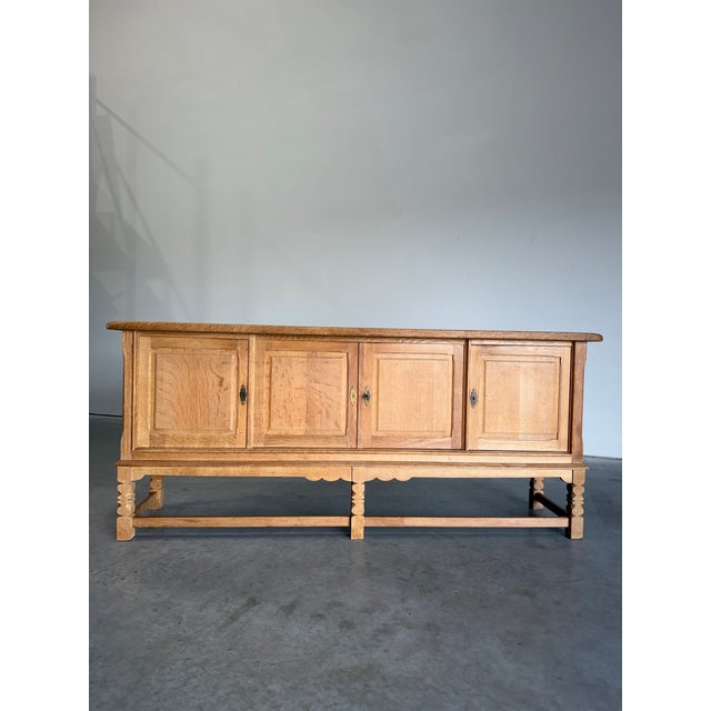 Mid Century Danish Brutalist Credenza or Sideboard in White Oak, attributed to Henning Kjaernulf. Locking doors at either...