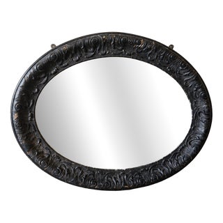 Late Victorian Ebonised Oval Bevelled Wall Mirror, 1890 For Sale