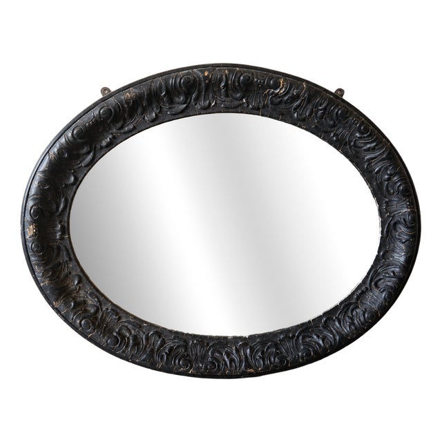 Late Victorian Ebonised Oval Bevelled Wall Mirror, 1890 For Sale