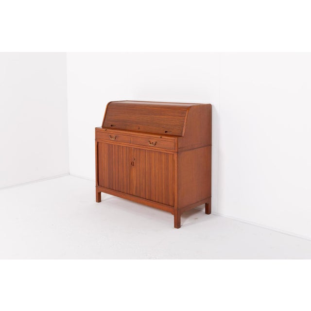 Spectacular and elegant mahogany and teak combination cabinet-desk from Carl-Axel Acking for Nordiska Kompaniet, 1950’s...