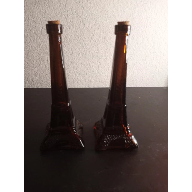 These are Amber Art Glass 6" Eiffel Tower Figurine Decanters Set of 2. MINIATURES