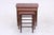 Vintage teak nesting tables with a clean, typically Danish design. The three tables can be nested together to save space...